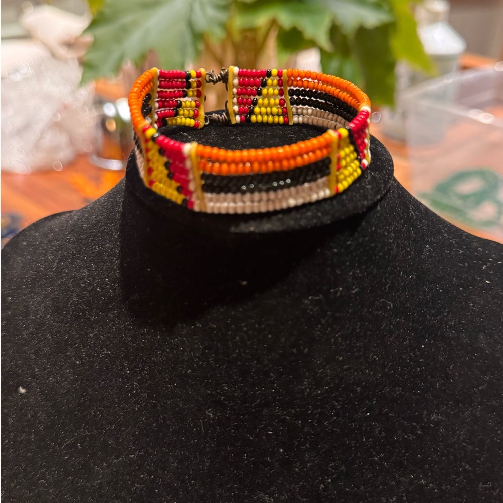 Handmade Multicolor Beaded Bracelet – Red, Yellow, Orange & Black Tribal Design